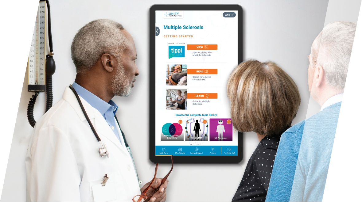 Male doctor and patients interacting with an exam room display device.