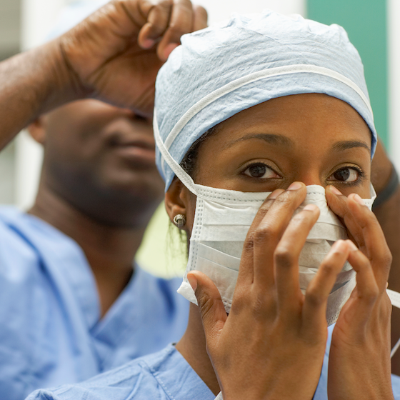 Doctor wearing a surgical face mask.