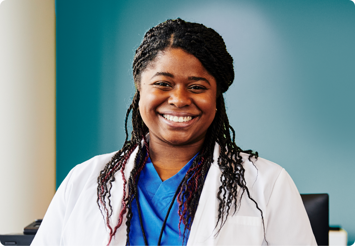 Young smiling female black doctor.