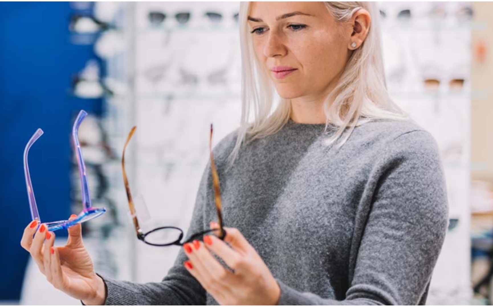 woman choosing to purchase optical lens